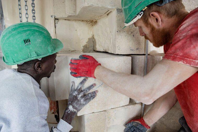 Replacing a stone in the coped wall © Patrick Zachmann – Magnum Photos / EP RNDP Magnum Photo.jpg